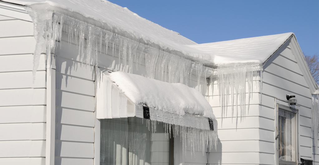 Winter house with icicles on it.