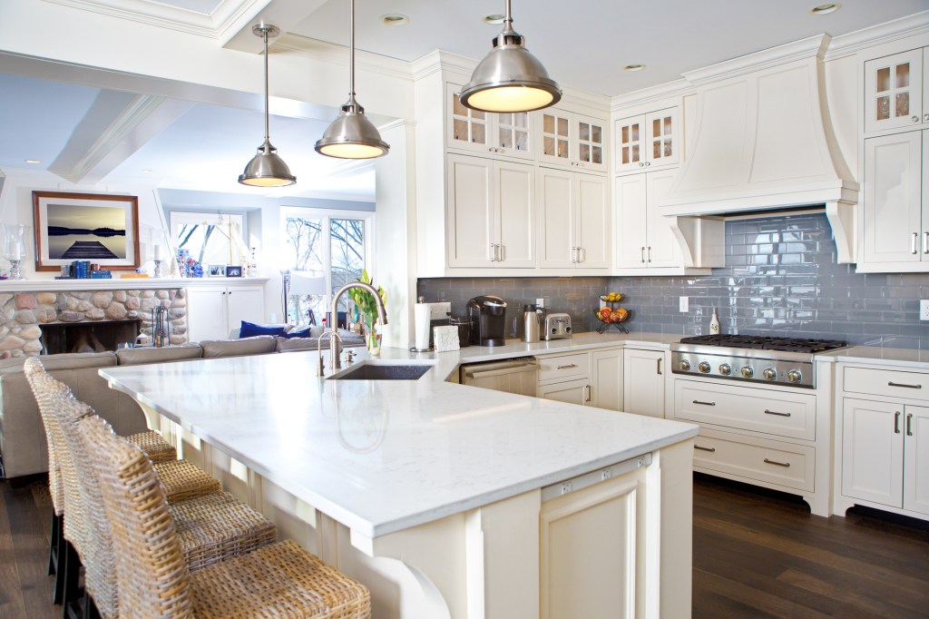 Modern kitchen design with open concept and bar counter.